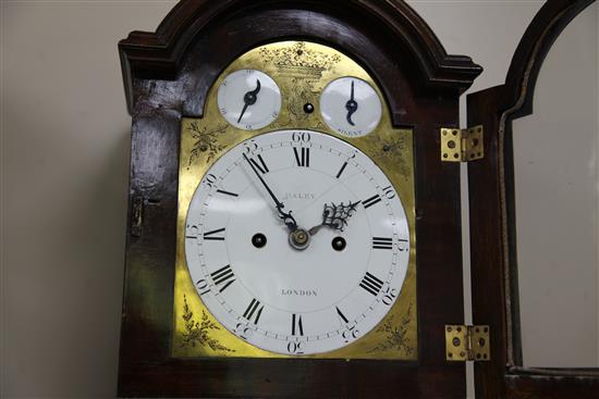 Haley of London. A George III brass inset chiming bracket clock, height 15.5in., with an associated wall bracket